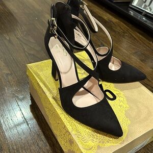 Only worn once, sexy heels with zipper in the back